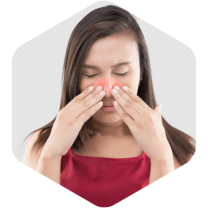 Woman showing discomfort in her nose.